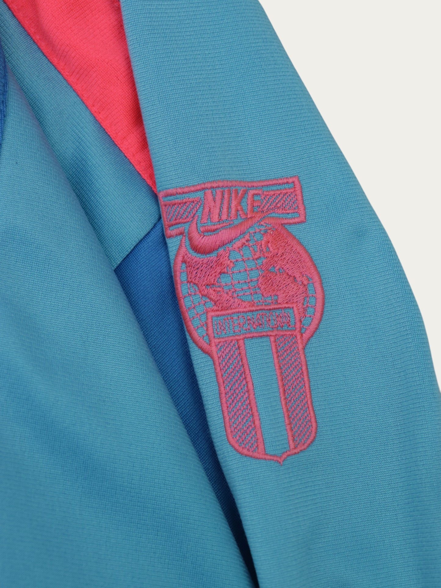 CHAQUETA NIKE INTERNATIONAL VINTAGE 90S