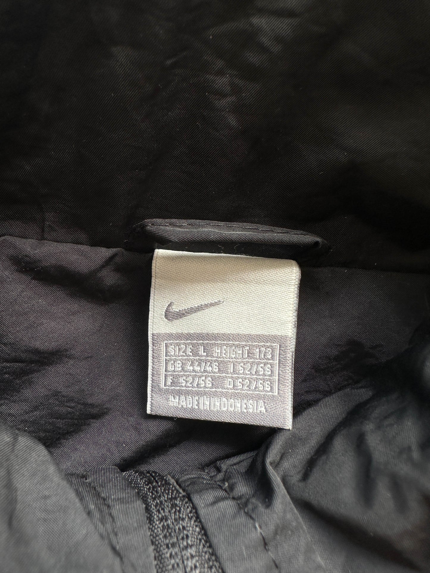 Chaqueta Nike vintage 00s bootleg