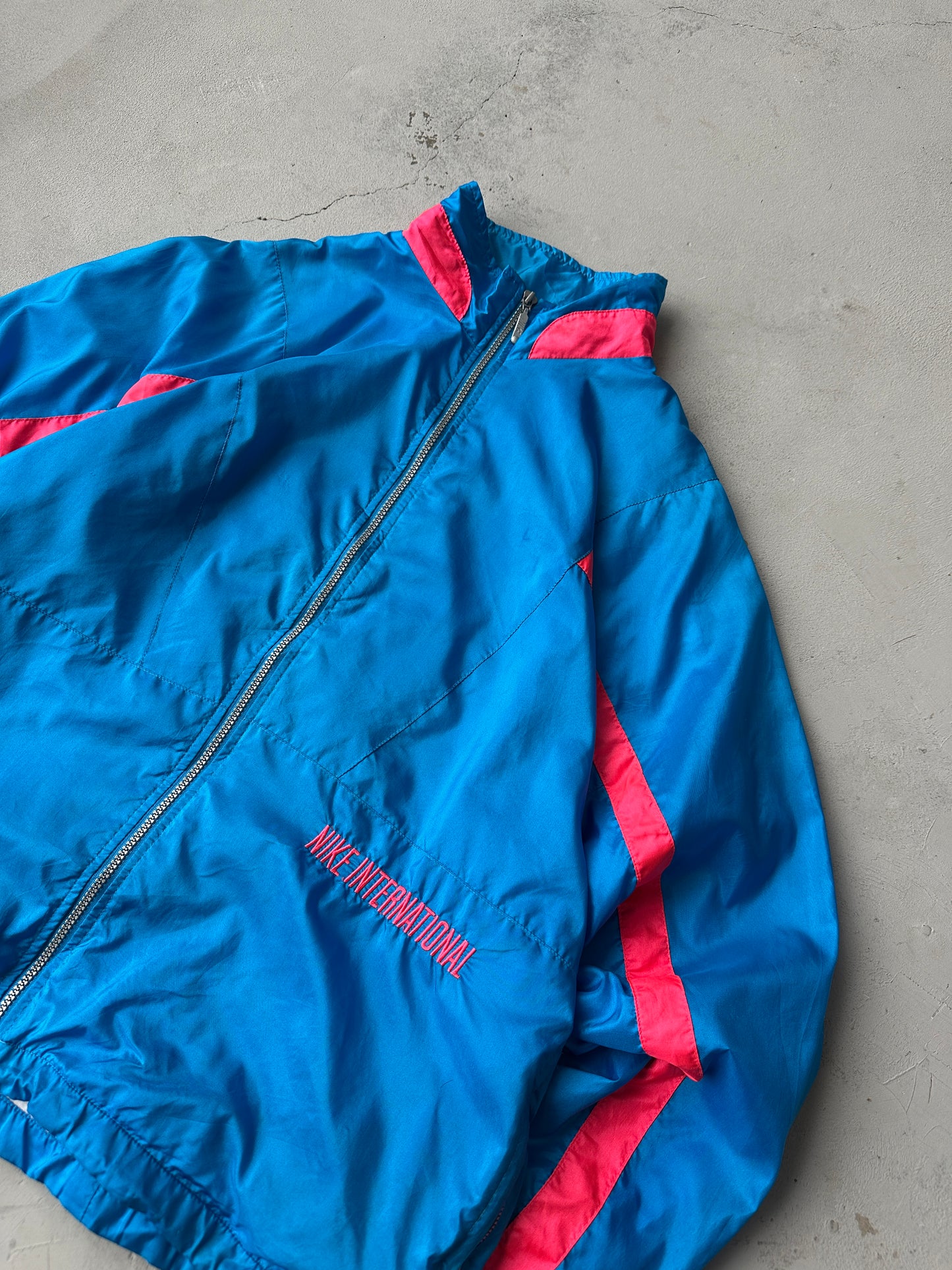 Chaqueta Nike International vintage 90s