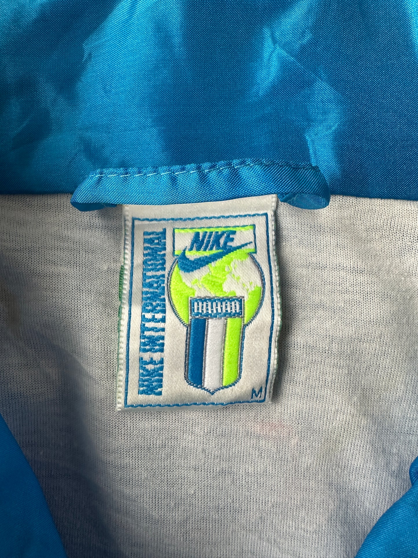 Chaqueta Nike International vintage 90s