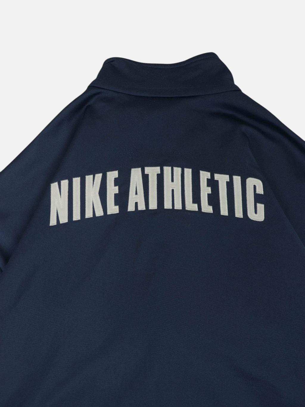 Chaqueta Alabama Vintage Nike azul marino de los años 90 con letras Nike Athletic bordadas en la espalda