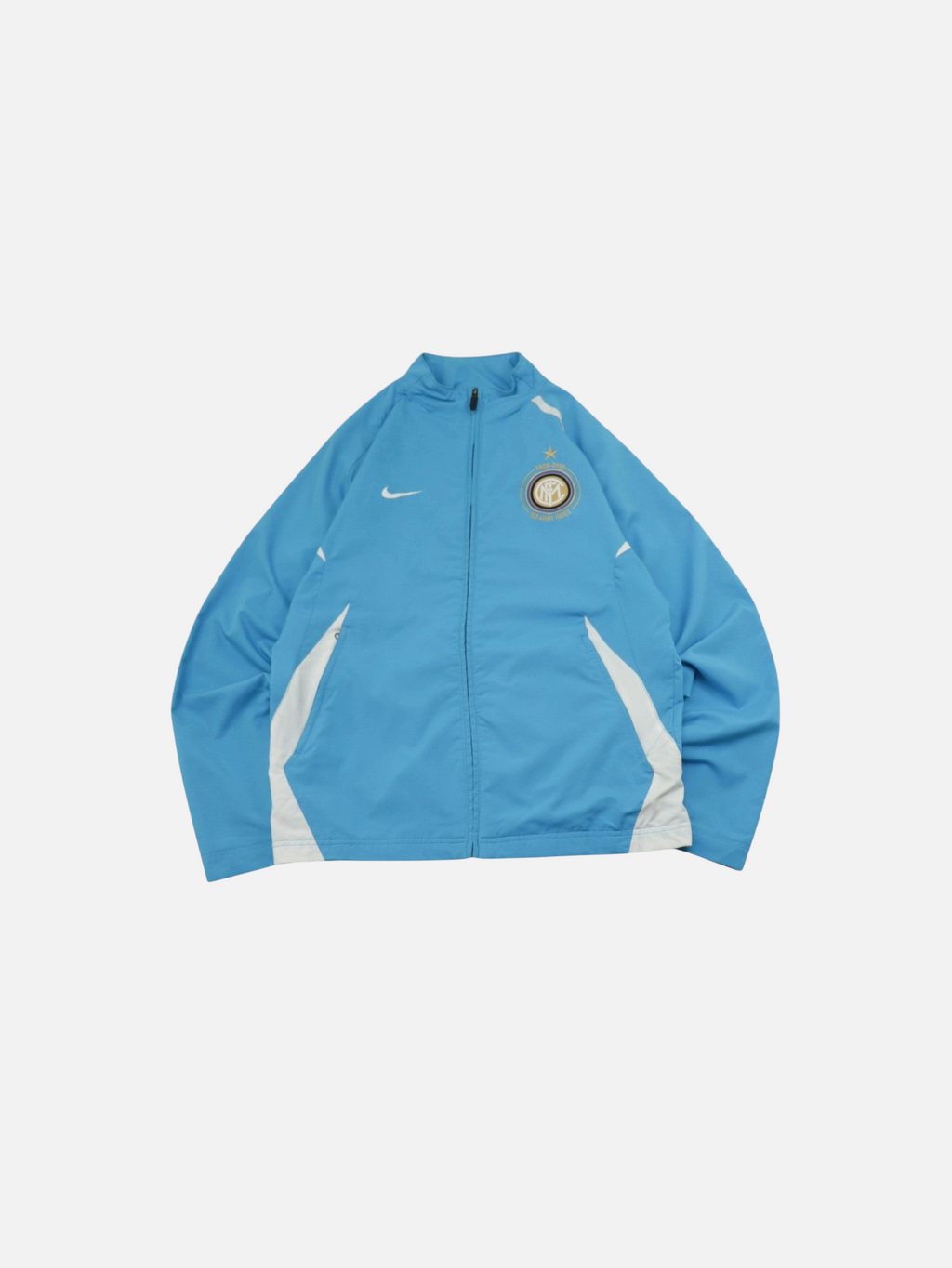 Chaqueta vintage Nike del Inter de Milán edición centenario 2007-08 en color azul claro, disponible en Alabama Vintage.