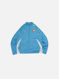 Chaqueta vintage Nike del Inter de Milán edición centenario 2007-08 en color azul claro, disponible en Alabama Vintage.