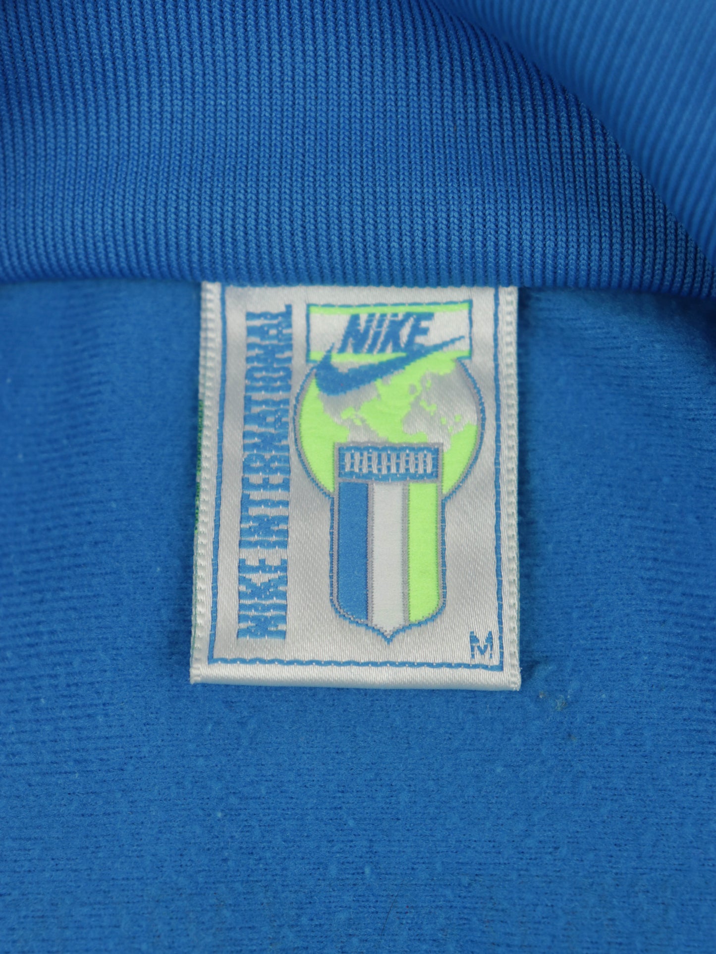 CHAQUETA NIKE INTERNATIONAL VINTAGE 90S