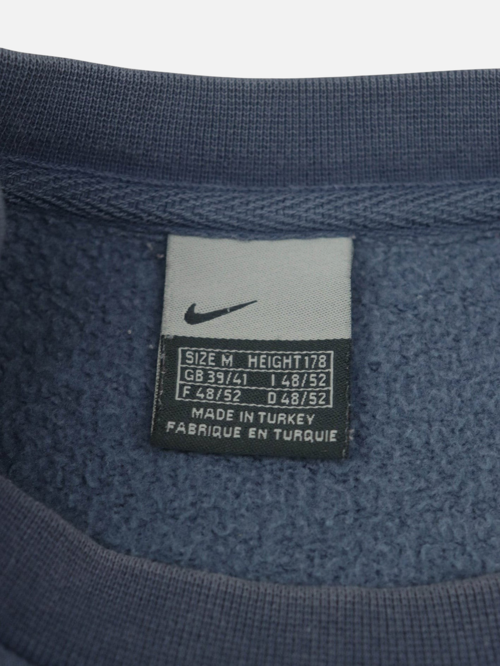 Etiqueta interior de sudadera Alabama Vintage Nike vintage de los años 2000 en color azul grisáceo, talla M