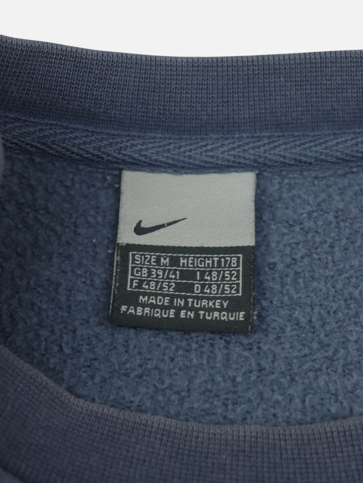 Etiqueta interior de sudadera Alabama Vintage Nike vintage de los años 2000 en color azul grisáceo, talla M