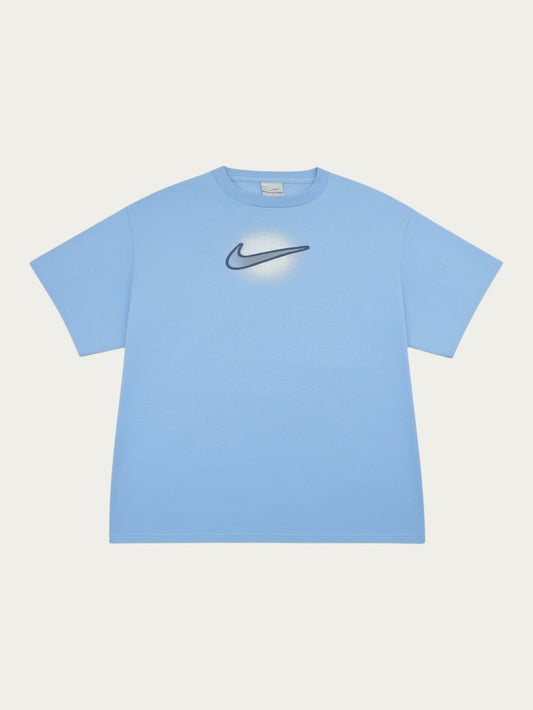 Camiseta Nike vintage de los 90 en color azul claro con logo central, de Alabama Vintage