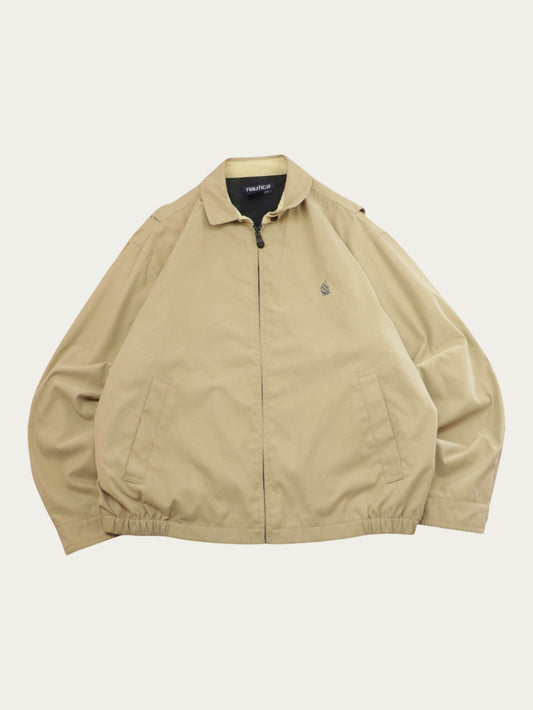 Alabama Vintage Harrington Nautica 00s beige jacket with zip closure and embroidered logo. Classic vintage outerwear.